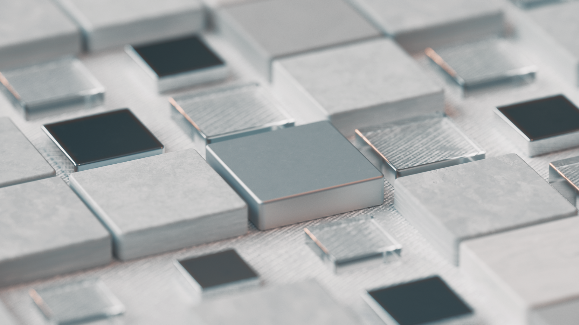 Metallic squares arranged in a grid pattern representing cloud infrastructure